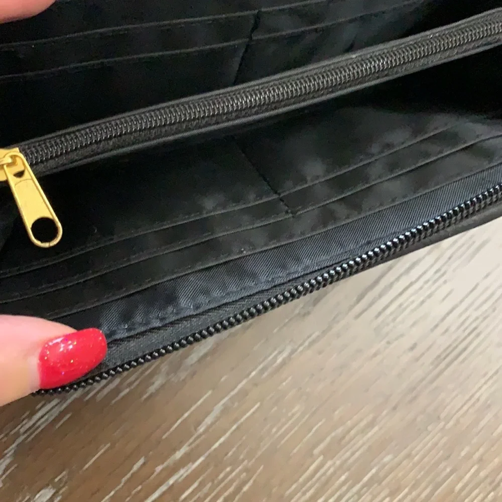 Unbranded black with black brads wristlets